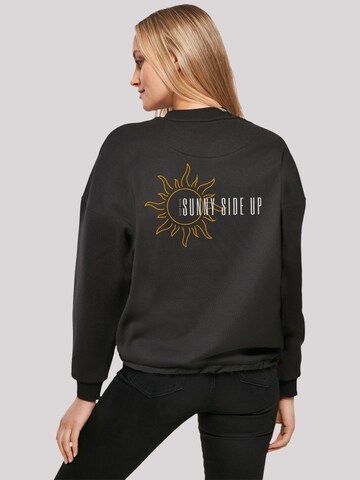 Sweat-shirt 'Sunny side up' F4NT4STIC en noir : devant