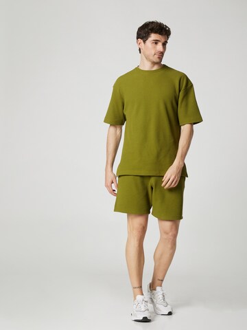 ABOUT YOU x Kevin Trapp Regular Pants 'Simon' in Green