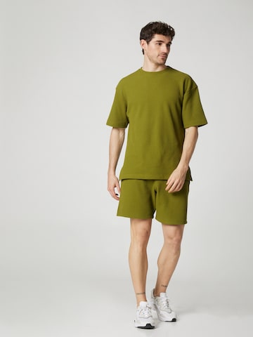 ABOUT YOU x Kevin Trapp Regular Trousers 'Simon' in Green