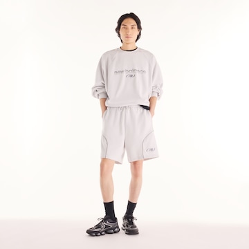 new balance - Sweatshirt 'Trackside French Terry Crew' em cinzento