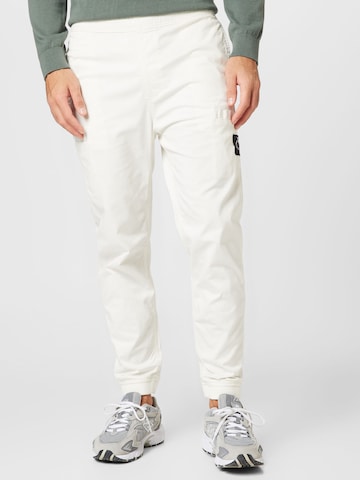 Calvin Klein Jeans Tapered Trousers in White: front