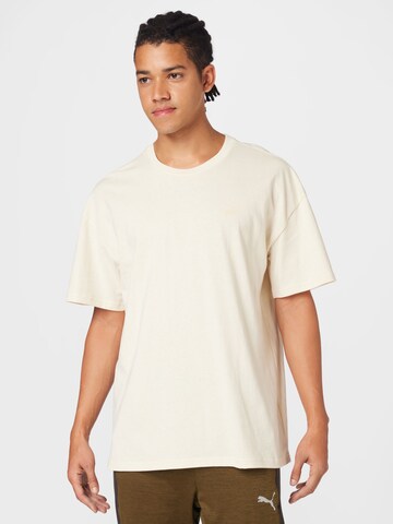 PUMA T-Shirt 'Classics' in Beige: predná strana