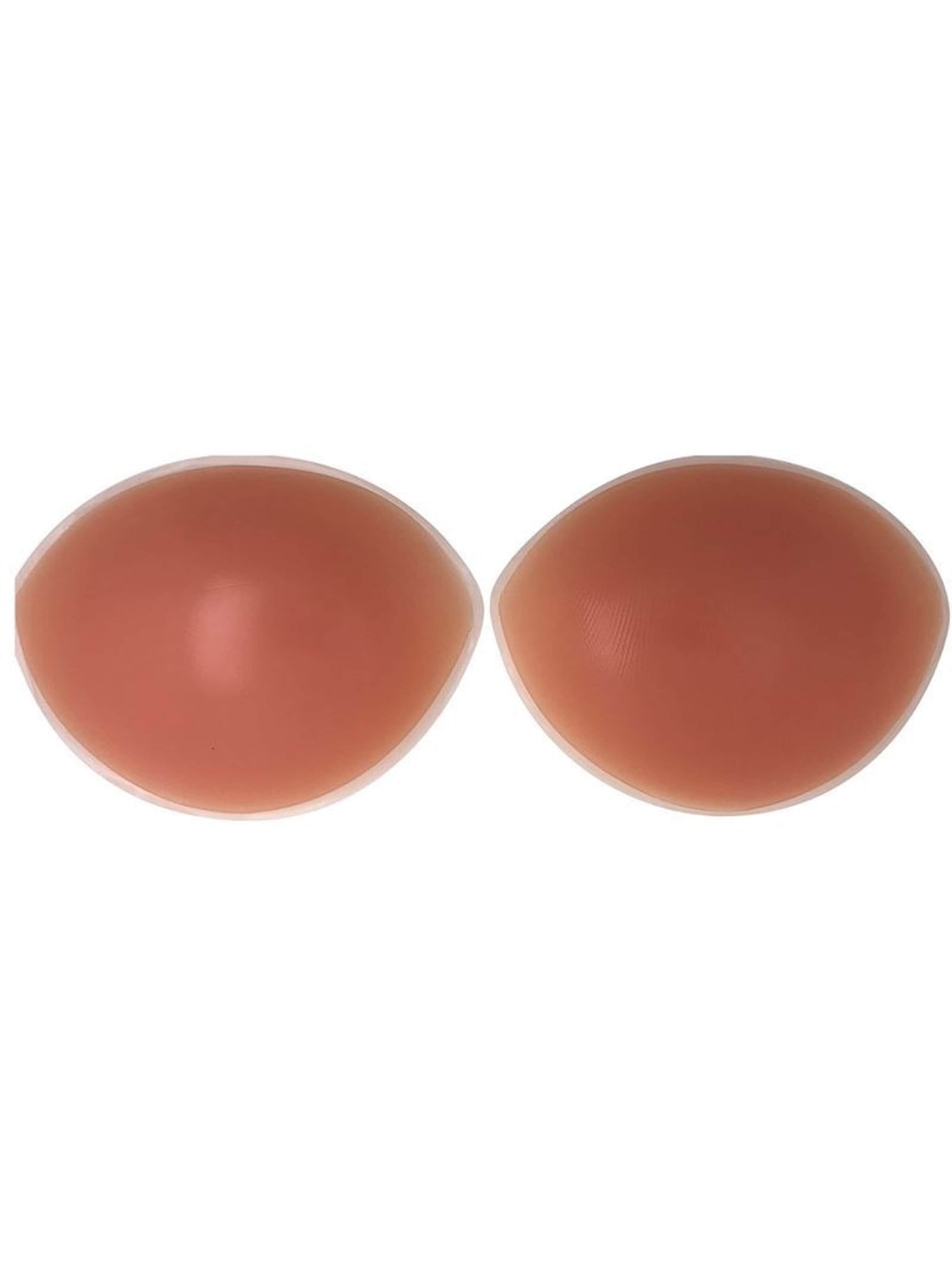 Accessorio per reggiseno 'Silicone Bra Inserts – Oval Push-Up Pads for Cleavage & Volume (1 Pair, 2 x 135g)' di UNIQ Beauty in beige: frontale