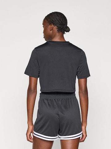 T-shirt fonctionnel 'MICHAELA' Reebok en noir