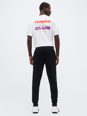 BJÖRN BORG - Tapered Calças de desporto 'ESSENTIAL 1' em preto