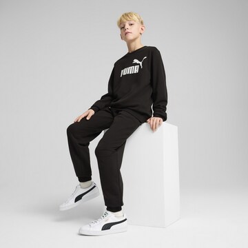 PUMA Joggingpak 'Essentials' in Zwart