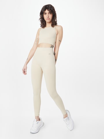 Skinny Pantaloni sportivi di aim'n in beige