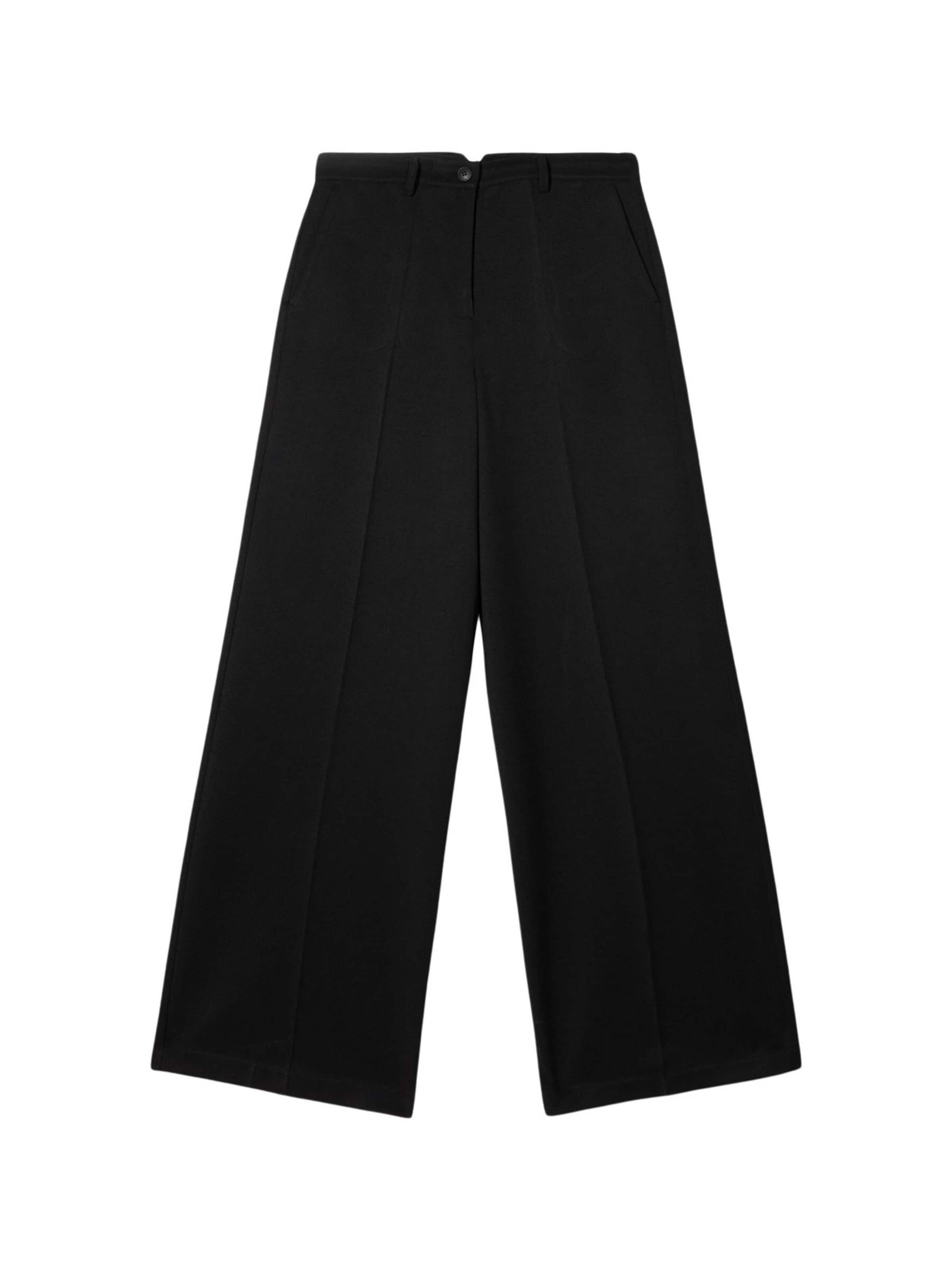 oltre Baggy Trousers in Black: front