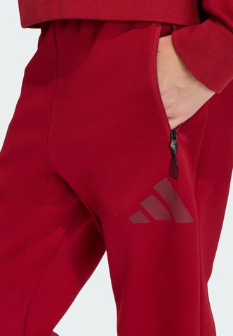 ADIDAS SPORTSWEAR Tapered Pants 'Z.N.E' in Red