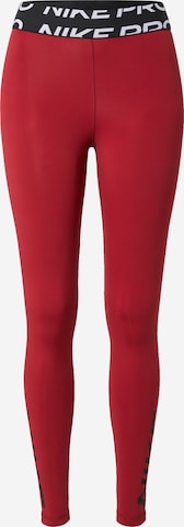NIKE Spodnie sportowe w kolorze czerwony: przód