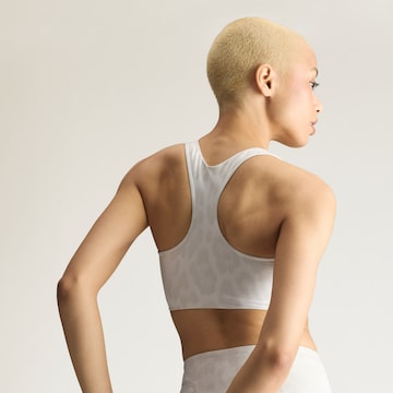 Bustino Reggiseno sportivo 'PrimeLiftImpact' di ADIDAS BY STELLA MCCARTNEY in bianco
