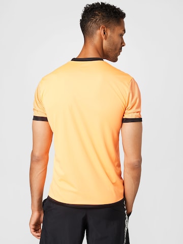 T-Shirt fonctionnel PUMA en orange