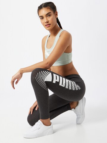 PUMA - Skinny Calças de desporto em cinzento