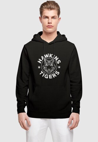 Sweat-shirt 'Stranger Things - Hawkins Tiger' ABSOLUTE CULT en noir : devant