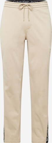 Loosefit Pantalon Calvin Klein Jeans en beige : devant