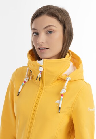 Manteau fonctionnel Schmuddelwedda en jaune