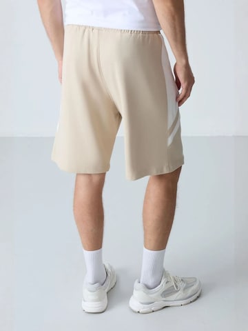 Regular Pantalon Tommy Life en mélange de couleurs
