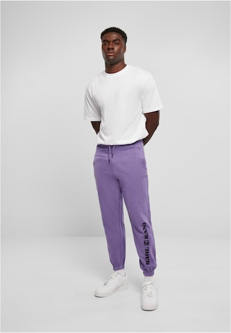Karl Kani Tapered Trousers in Purple