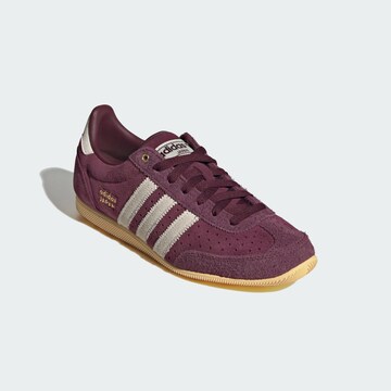 Baskets basses ADIDAS ORIGINALS en rouge