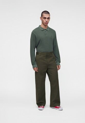 Carhartt WIP Wide leg Trousers 'Master' in Green