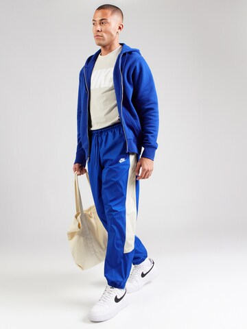 mėlyna Nike Sportswear Siaurėjantis Kelnės
