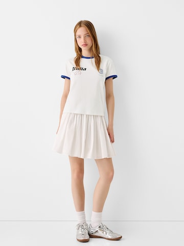 Maglietta di Bershka in beige