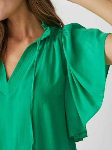 Maglietta di co'couture in verde