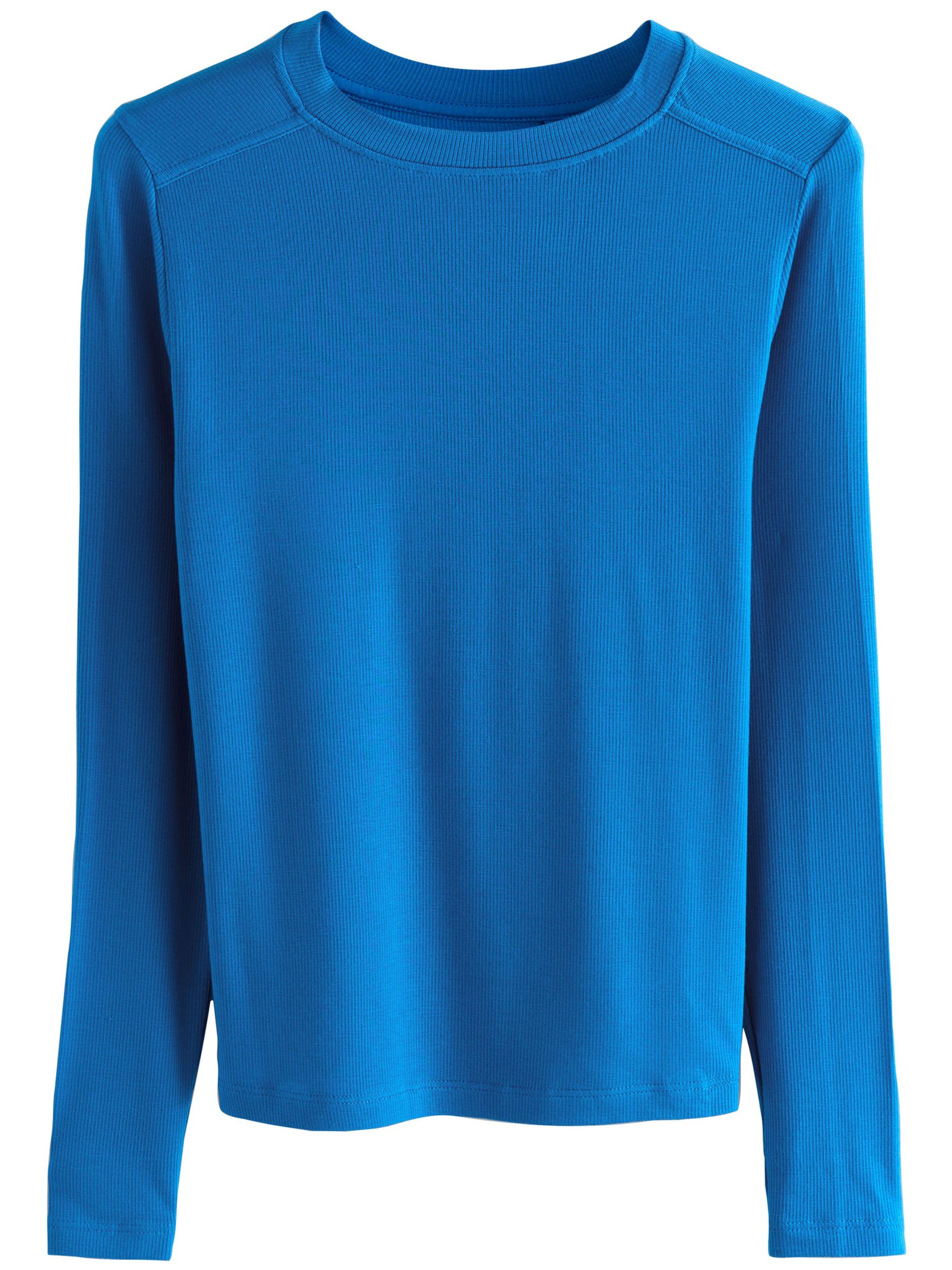 Next T-shirt i blå: framsida