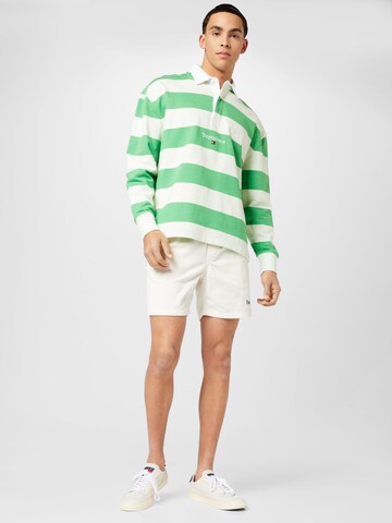 Tricou de la Tommy Jeans pe verde