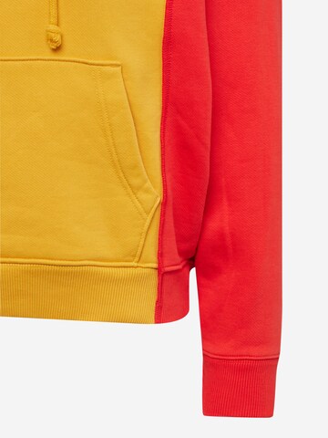 Sweatshirt & Sweatjacke Tommy Remixed en jaune