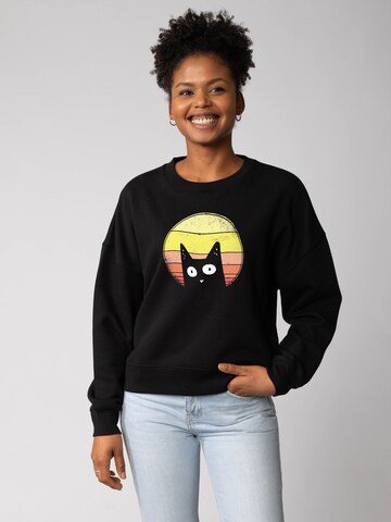 Sweat-shirt 'Sunset Cat ' Watapparel en noir : devant