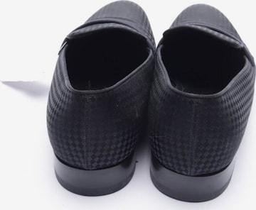 Louis Vuitton Flats & Loafers in 43 in Black