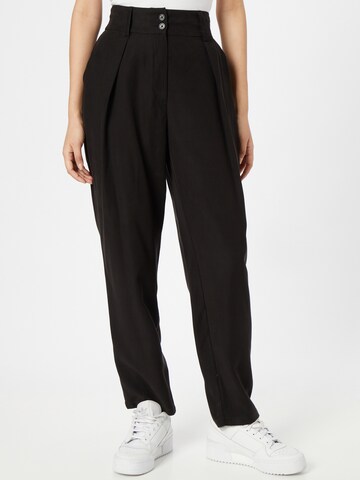 Loosefit Pantalon à pince 'Alina' ABOUT YOU en noir : devant