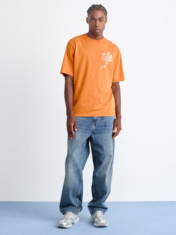 Tricou 'BRK' de la Jordan pe portocaliu