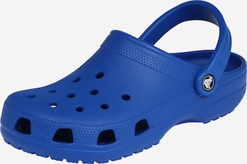 Crocs Clogs in Blue: front