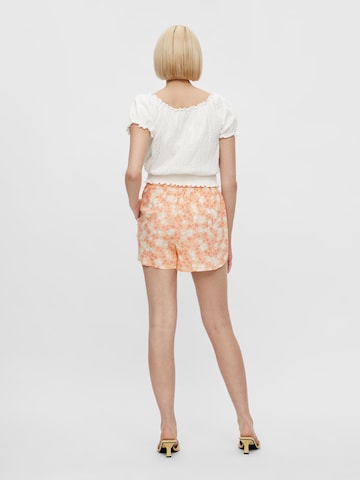 PIECES Regular Shorts 'Nya' in Orange