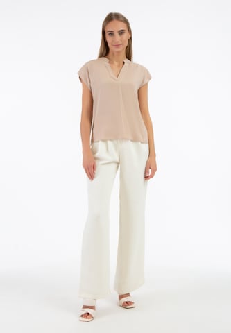 RISA - Blusa en beige