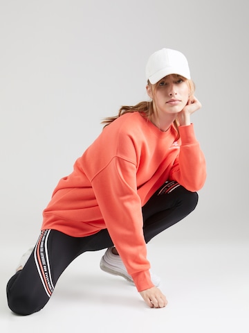 UNDER ARMOUR Sport sweatshirt i röd