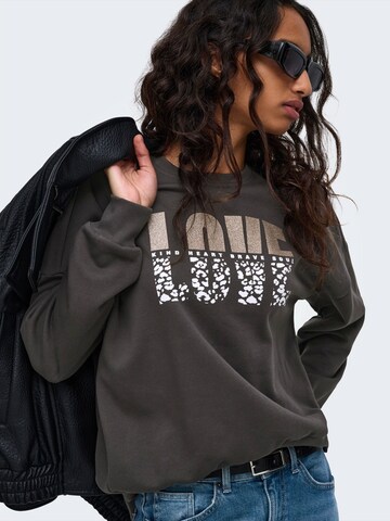 ONLY Sweatshirt 'TAMMIE' in Zwart: voorkant