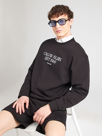 Calvin Klein Jeans Sweatshirt '1968 NYC' in Zwart: voorkant