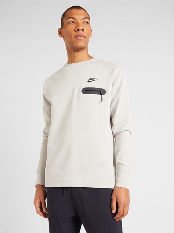 Sweat-shirt 'TECH' Nike Sportswear en gris : devant