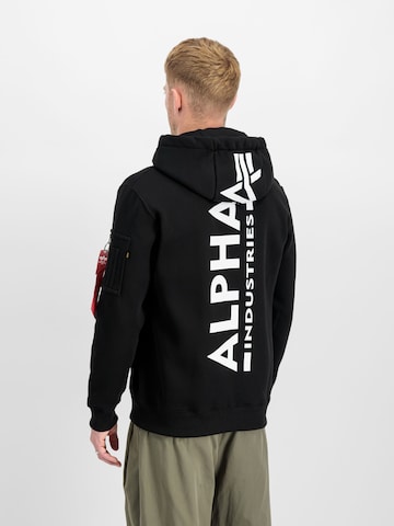 ALPHA INDUSTRIES Bluzka sportowa 'Backprint' w kolorze czarny