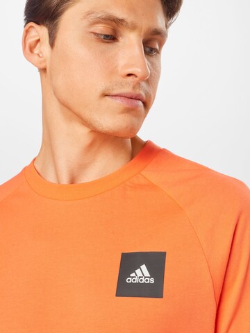 ADIDAS SPORTSWEAR Функционална тениска в оранжево