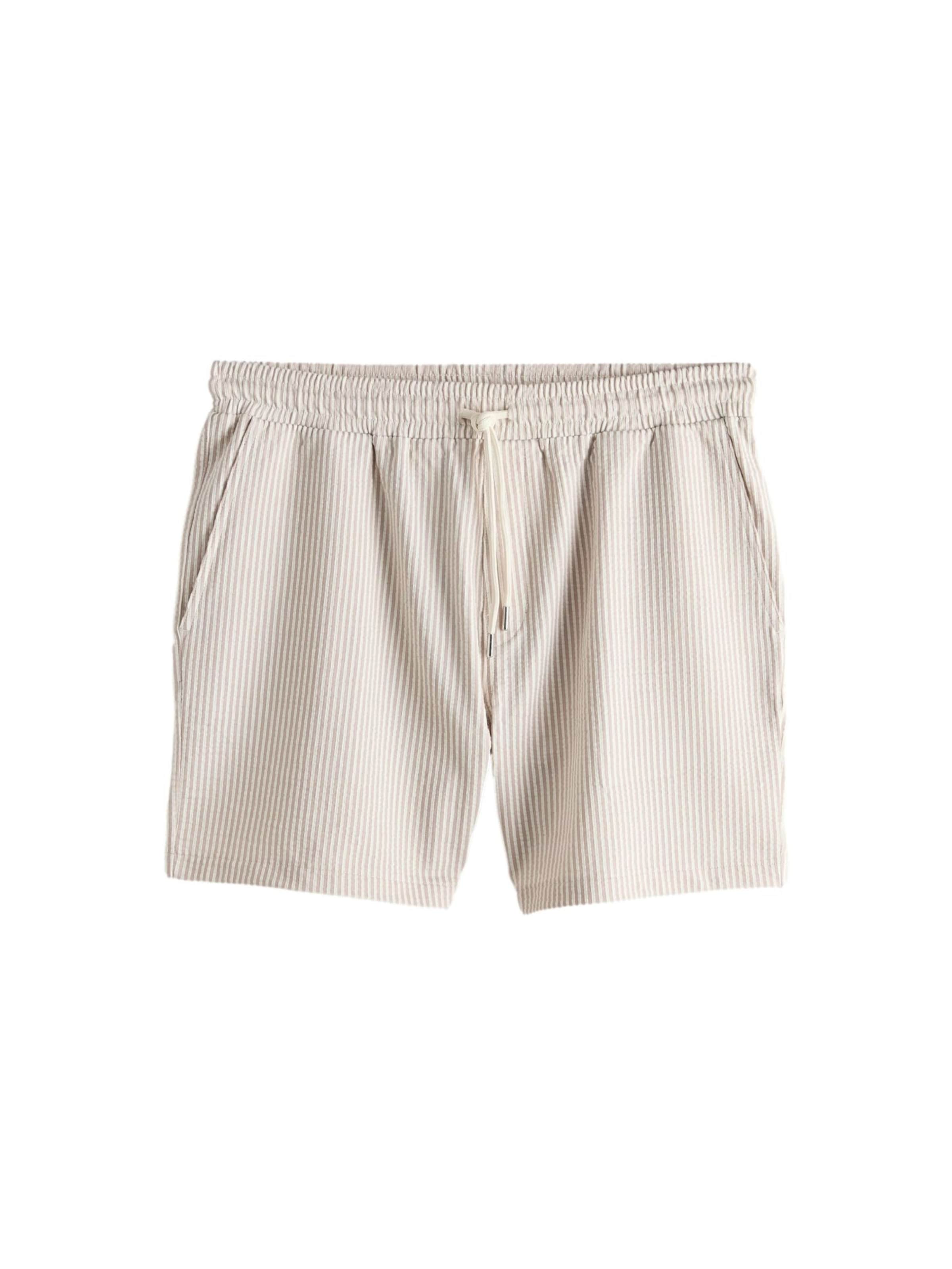 Next Regular Byxa i beige: framsida