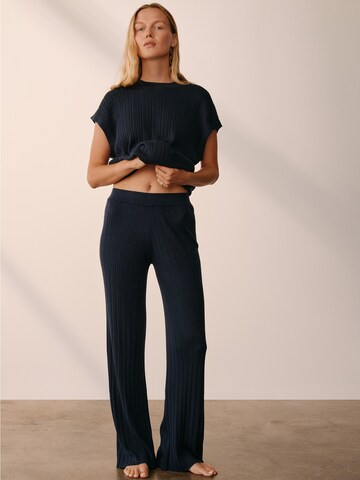 ABOUT YOU x Marie von Behrens Flared Trousers 'Freya' in Blue