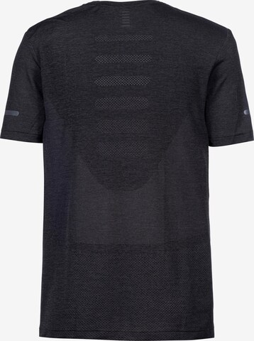 Maglia funzionale di UNDER ARMOUR in nero