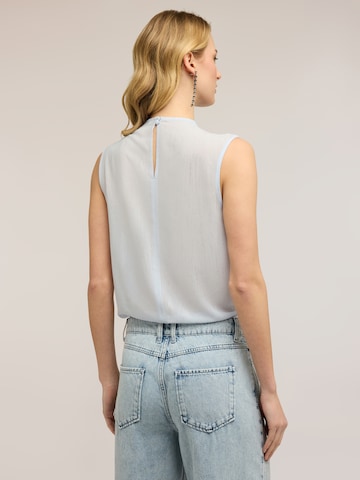 Top di MOTIVI in blu