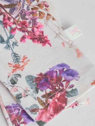 Set Next en rose