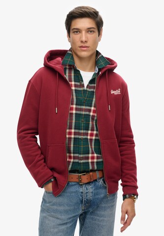 Veste de survêtement Superdry en rouge : devant