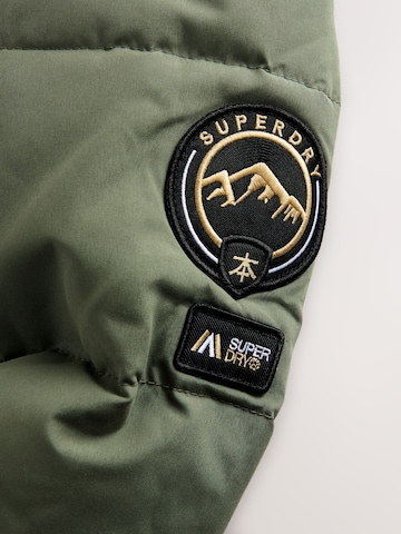 Superdry Pitkä takki värissä vihreä
